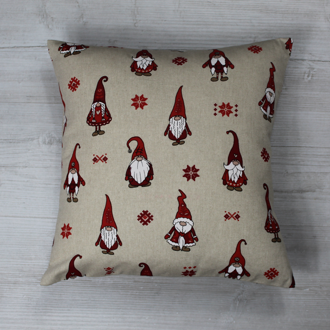 Cushion with multiple Red gnomes on a linen look fabric